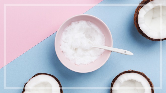 coconut oil and coconuts on pink and blue background